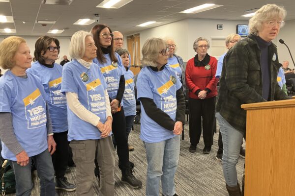 Council members vote 5-4 to adopt comprehensive plan which stirred strong controversy